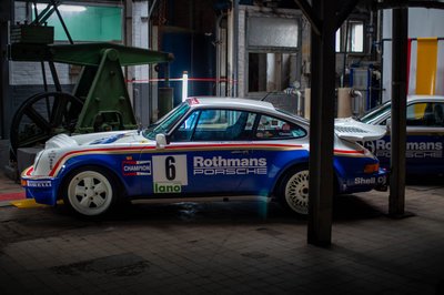 Rothmans Porsche 911 SC number 6 full side profile, Champion Pirelli livery, historic rally car classic motorsport photography